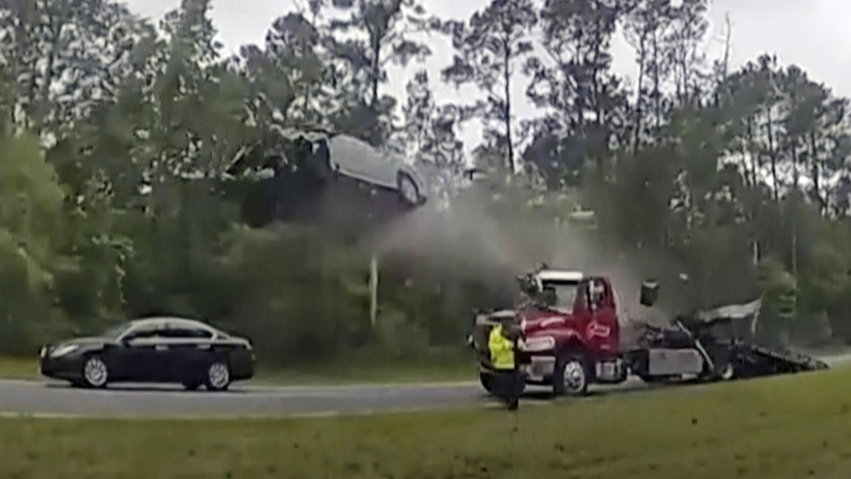 Driver whose car vaulted over tow truck says: 'I thought I was going to die'